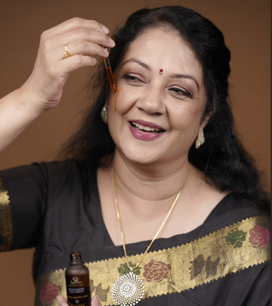 Shanthi Krishna applying Sundara Kayakalp Revitalizing Face Serum