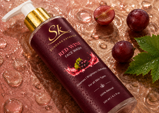 Sundara Kayakalp Red Wine Face Wash with red grapes and water droplets